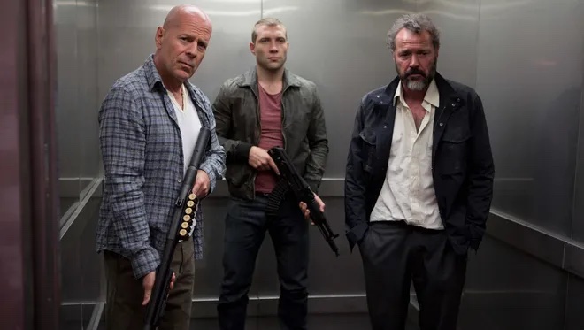 Bruce Willis and Jai Courtney as John and Jack McClane in A Good Day to Die Hard