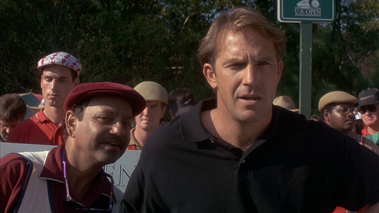 Roy "Tin Cup" McAvoy (Costner) with His Caddie and Best Friend Romeo (Cheech Marin)
