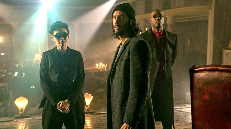 Bugs (Jessica Henwick), Neo (Keanu Reeves), and Morpheus (Yahya Abdul-Mateen II) in The Matrix Resurrections