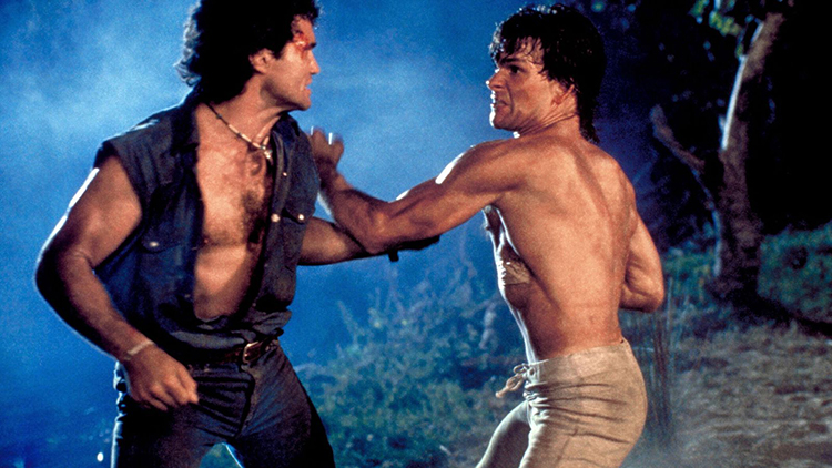 Dalton (Patrick Swayze) Faces Off with Jimmy (Marshall R. Teague) in Road House